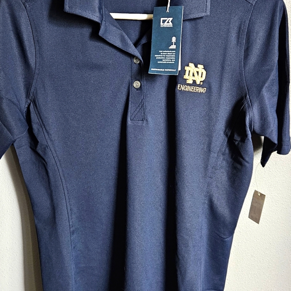 NWT Cutter & Buck Notre Dame women's size medium navy polo.
